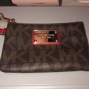 Michael Kors brown wallet/wristlet with MK logo